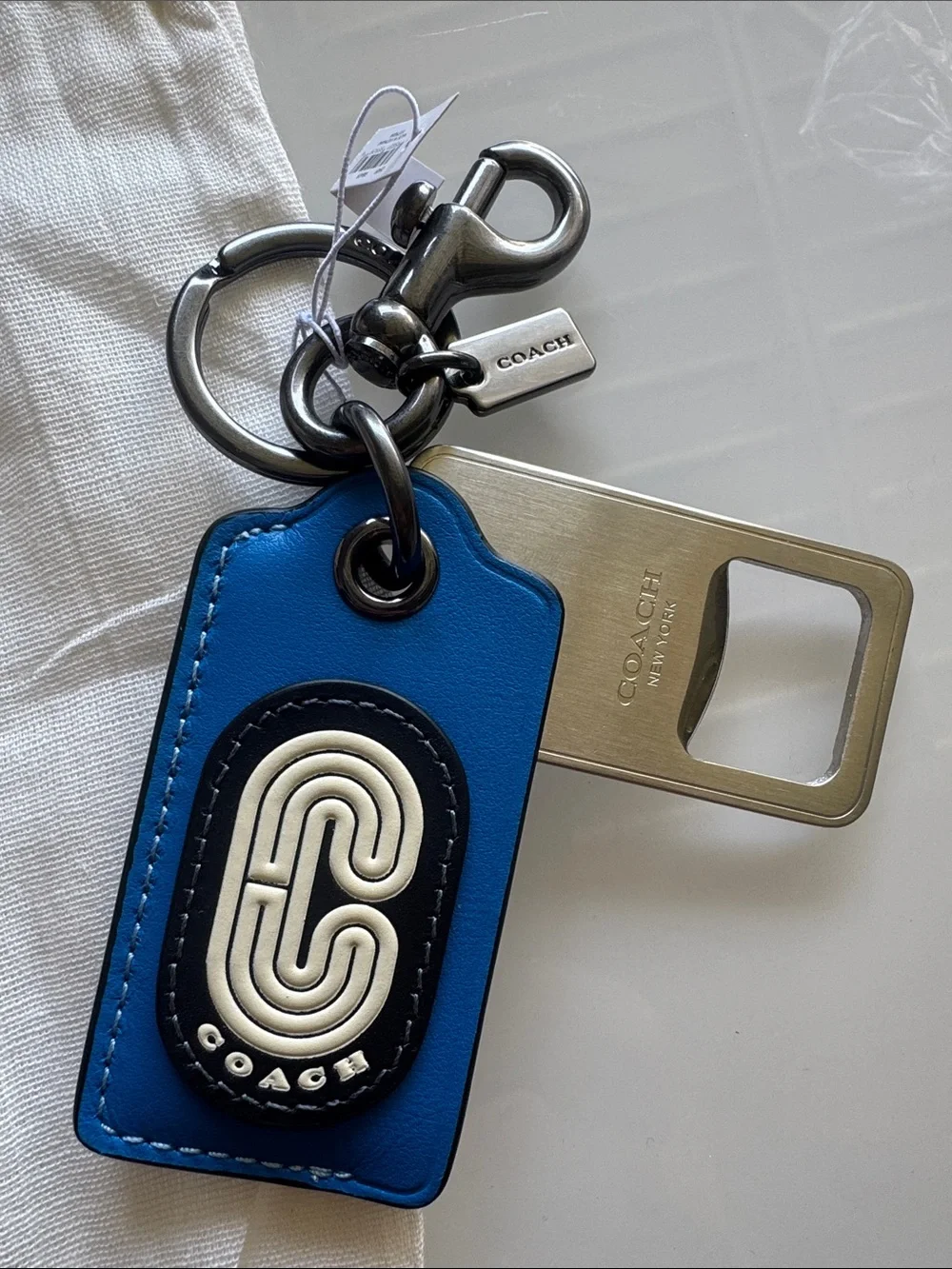 Coach Bottle Opener with Blue Leather  Logo Emblem